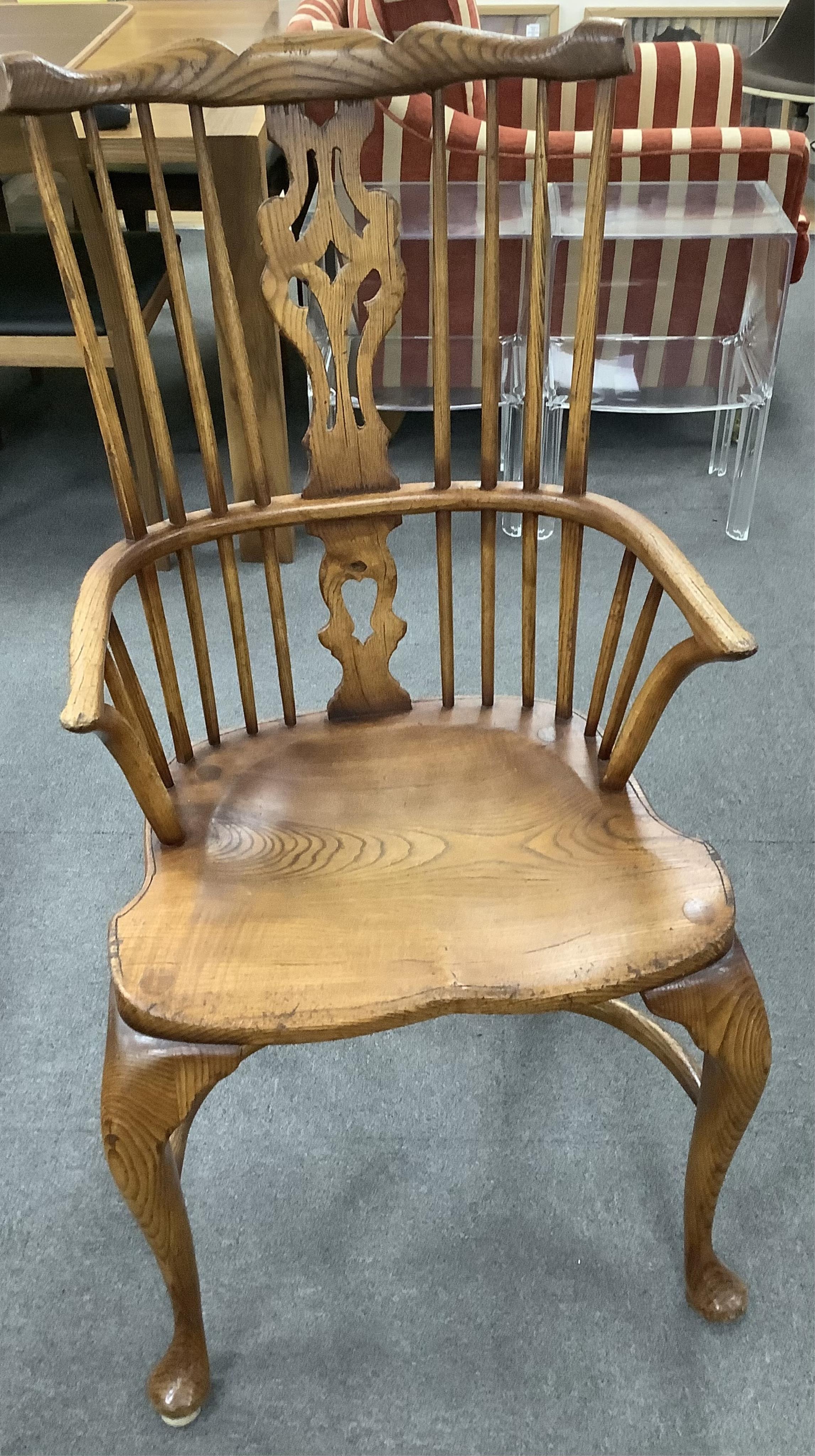 A set of six Titchmarsh & Goodwin elm Windsor chairs, two with arms. Condition - fair to good